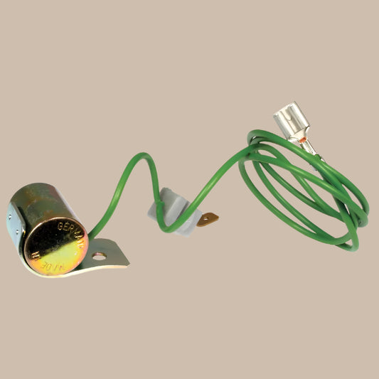 Thermocouple with green wire on a white background